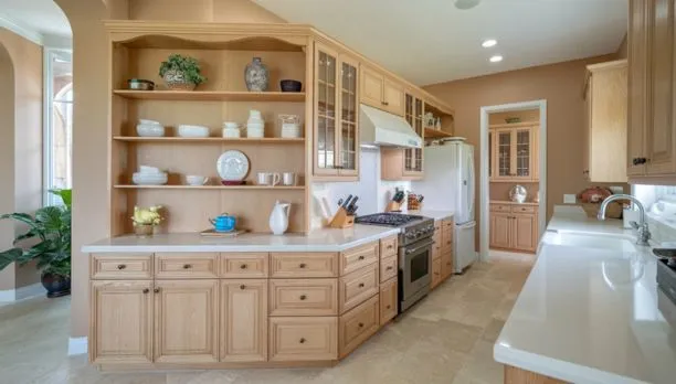 wood-cabinets-with-white-countertops