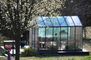 How much does a 12x12 sunroom cost, backyard glass sunroom addition attached to a home