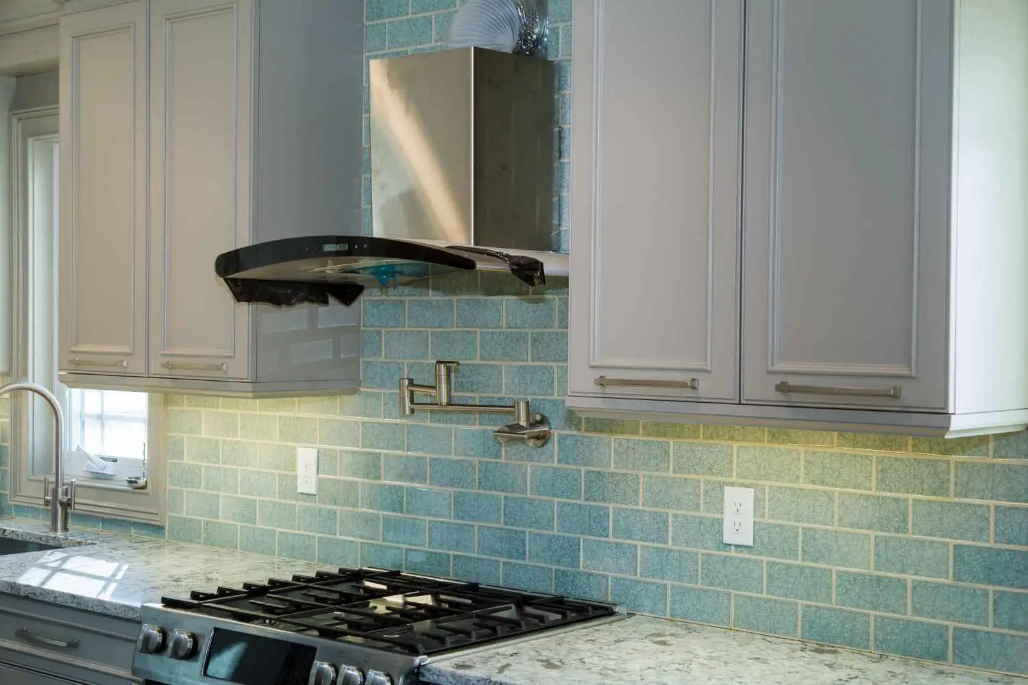 What a pot filler does, wall mounted pot filler faucet above stove for filling large pots directly on the cooktop